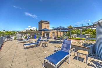 Rooftop deck with outdoor fireplace & bbqs